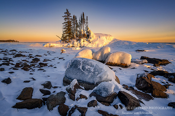 Sunset at the "Tombolo" with ice, March '22 1