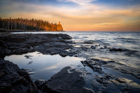 Split Rock lighthouse, lit up at sunset, Nov. '22 2