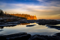 Split Rock lighthouse, lit up at sunset, Nov. '22 1