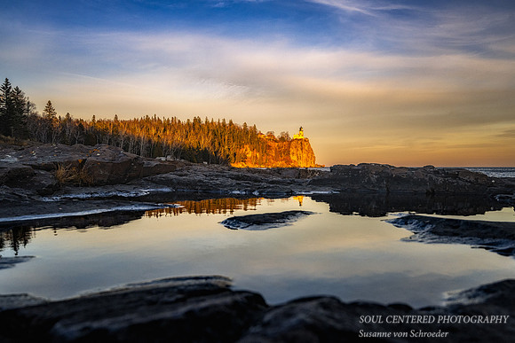 Split Rock lighthouse, lit up at sunset, Nov. '22 1