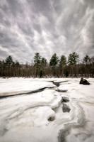 Frozen Flambeau river on a cloudy day, Dec. '25 2