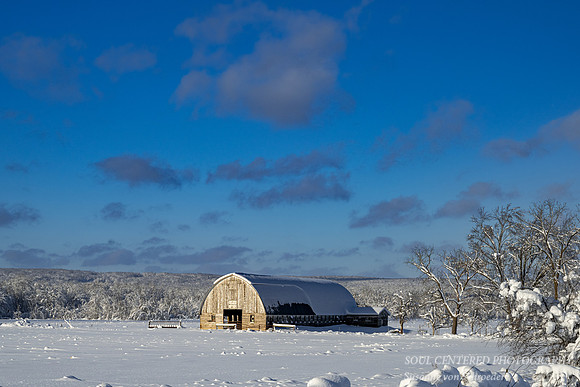 Winter barn with the Blue Hills in the background