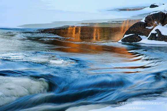 Reflections in winter river
