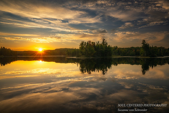 Sunset with clouds and reflections, Sept. '25 1
