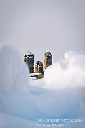 Silos behind snowdrift