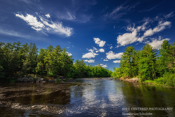 Flambeau river with clouds, June '26