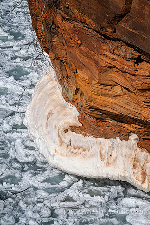 Red sandstone cliff and pancake ice 1