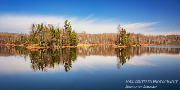 Calm spring morning with reflections, Audie Lake, April '26 1, panorama