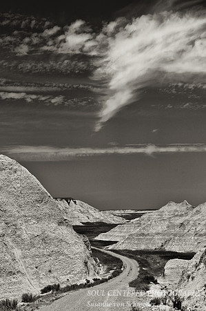 Badlands road & clouds, bw