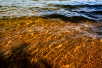 Golden, web like Lake Superior water