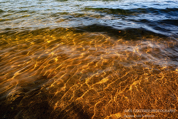 Golden, web like Lake Superior water