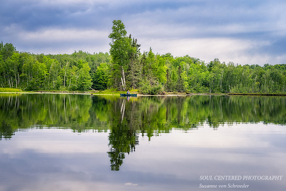 Cloudy summer evening at Audie Lake with canoe, '23