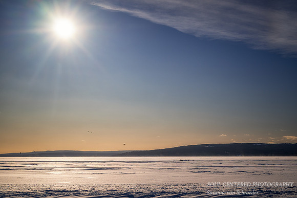 Ice road with eagles in the sky