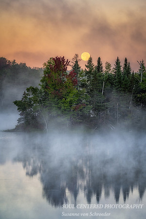 Super Blue Full moon setting, Audie Lake, Aug. '23