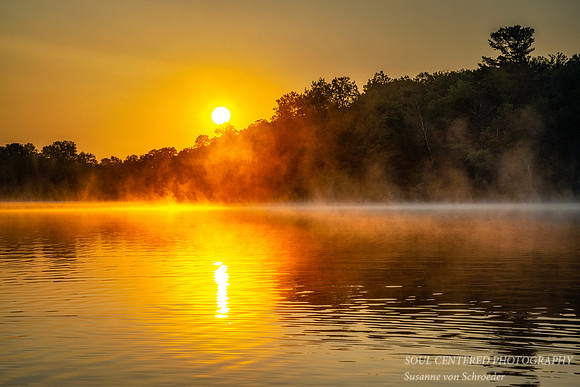 Audie Lake looks like it's on fire, sunrise in July