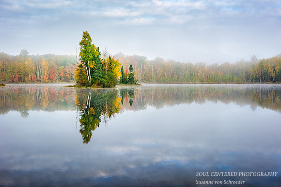 Island on foggy morning, fall