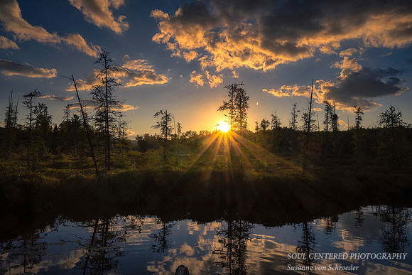 Late summer sunset, clouds and bog