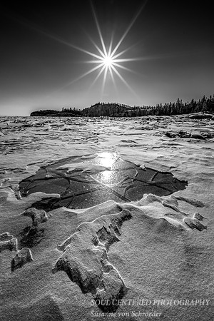Winter landscape with sun star, Black & White
