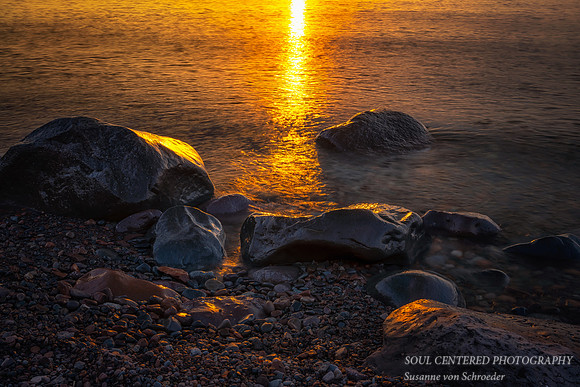 Orange sunlight trail, Lake Superior sunrise