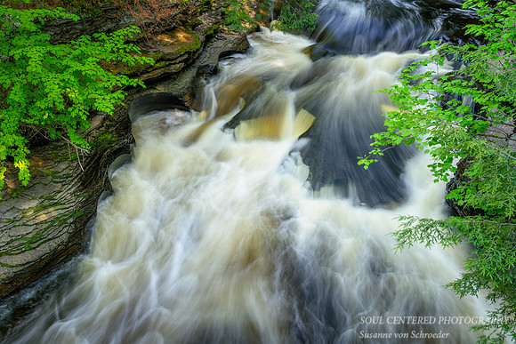 Presque Isle river with pot holes, June 2020