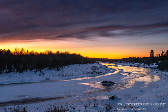 Sunset colors reflecting on ice