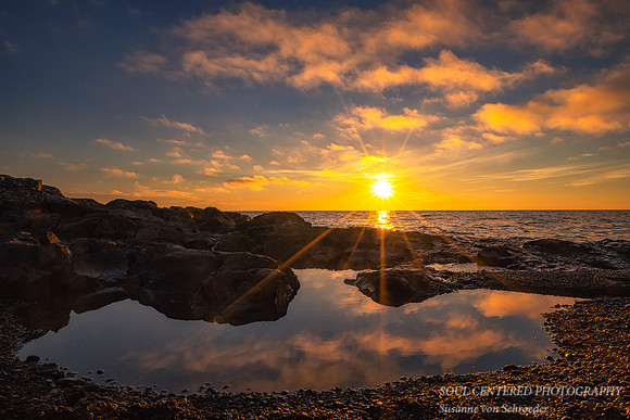 Lake Superior sunrise with reflections - Temperance River State park