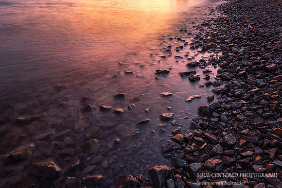 Beach pebbles in evening light