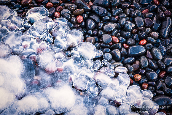 Ice and beach pebbles