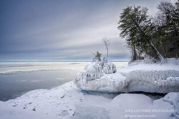 Winter scene, ice covered rock, Madeline Island, March '22 2