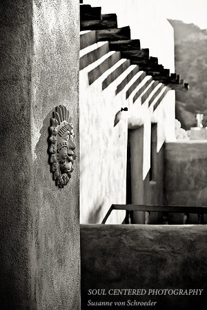 Adobe wall w. sun, bw