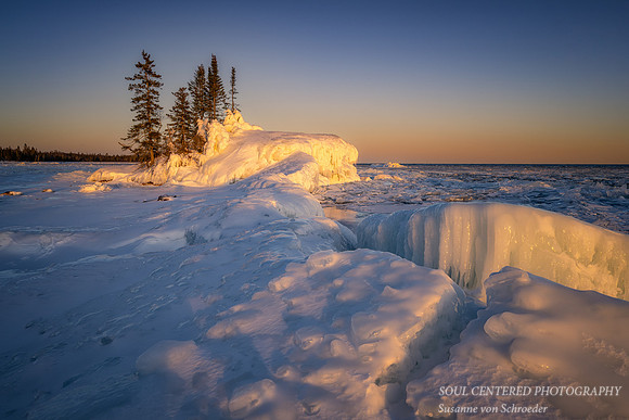 Sunset at the "Tombolo" with ice, March '22 2