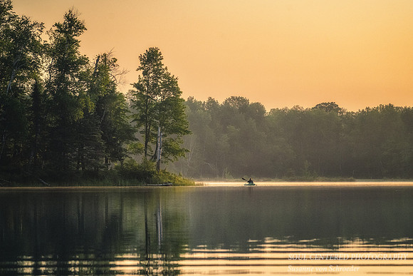 Kayaking in morning light, Audie Lake
