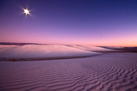 Moon over dunes