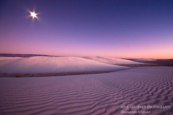Moon over dunes